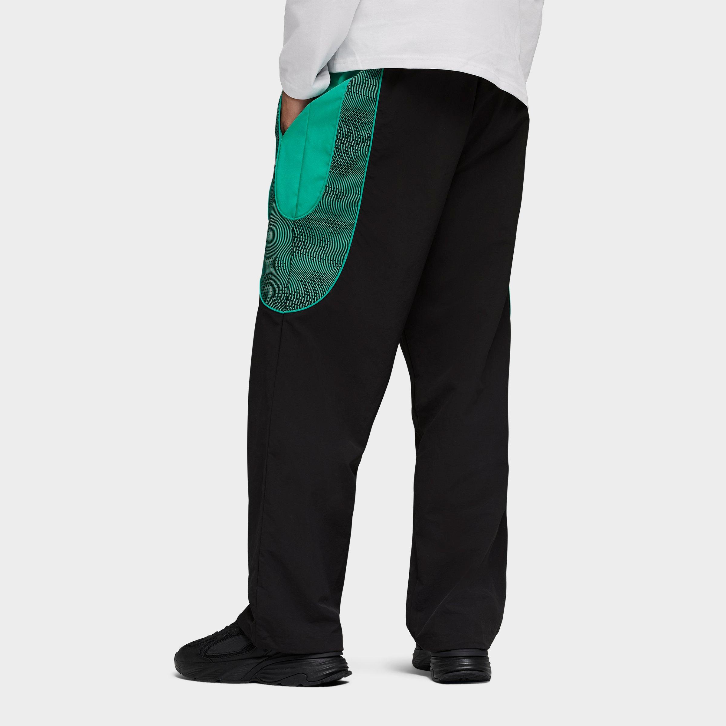 Men's Puma PUMATECH-X Relaxed Woven Track Pants