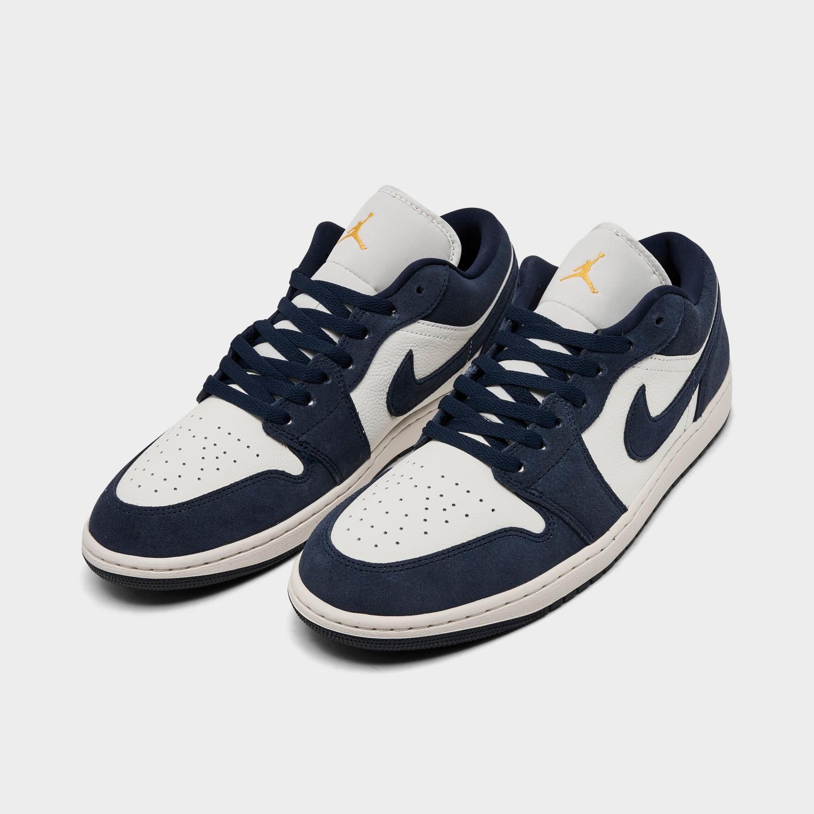 Men's Air Jordan Retro 1 Low SE Casual Shoes - Obsidian/University Gold/Chile Red/Obsidian - Left shoe facing left. Outside of the shoe. - view 2