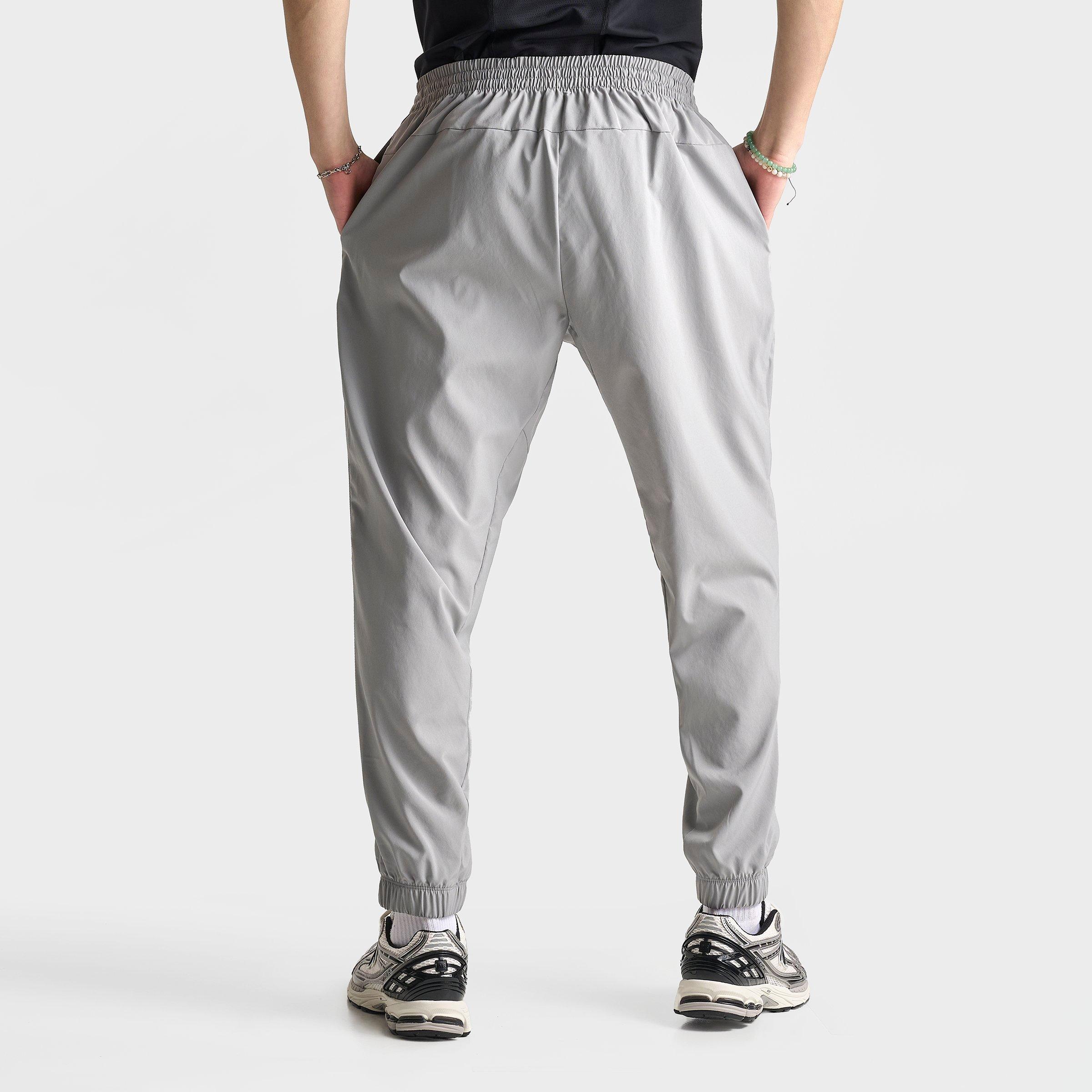 Men's New Balance Woven Zip Pocket Jogger Pants