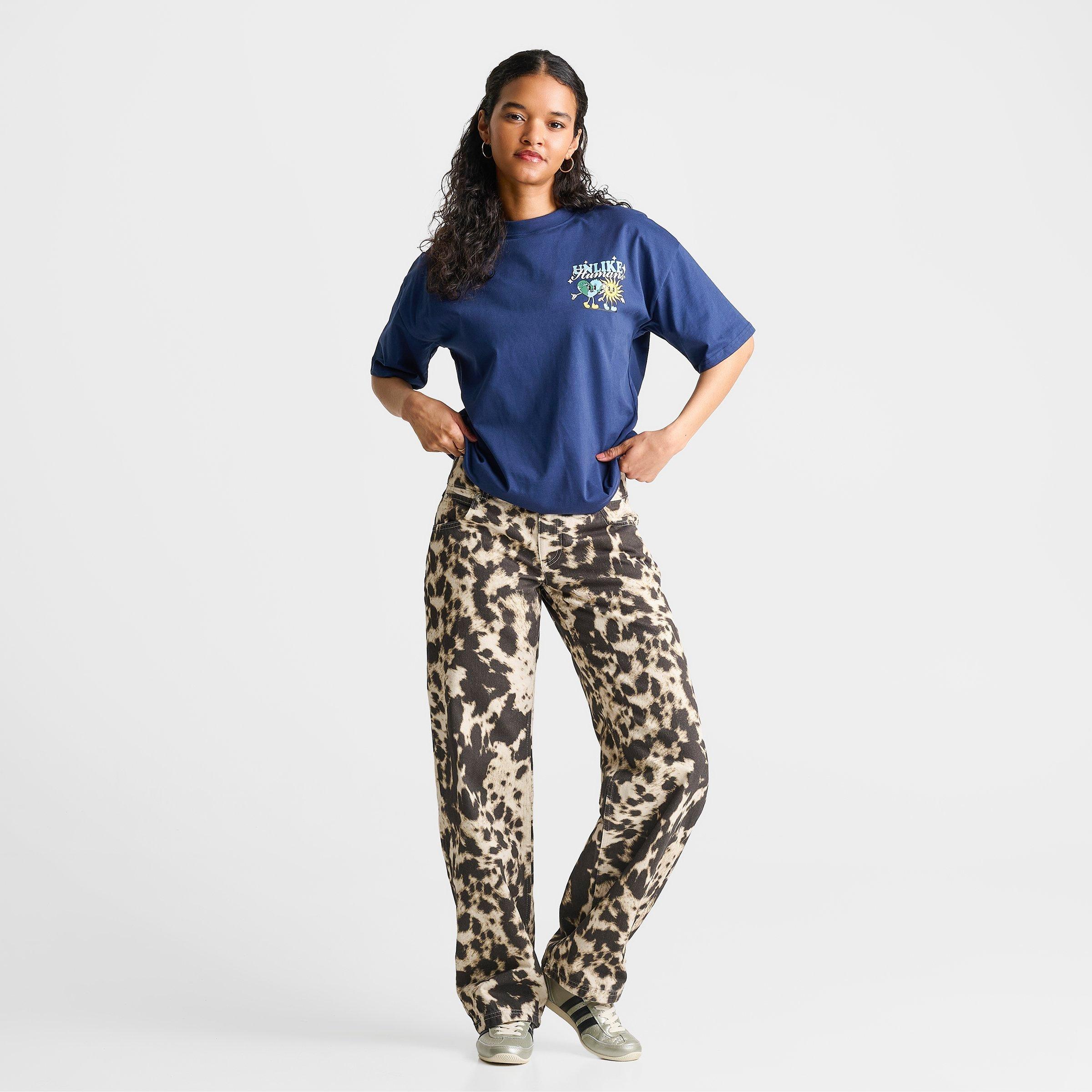 Women's Unlike Humans Low Rise Cow Print Denim Jeans