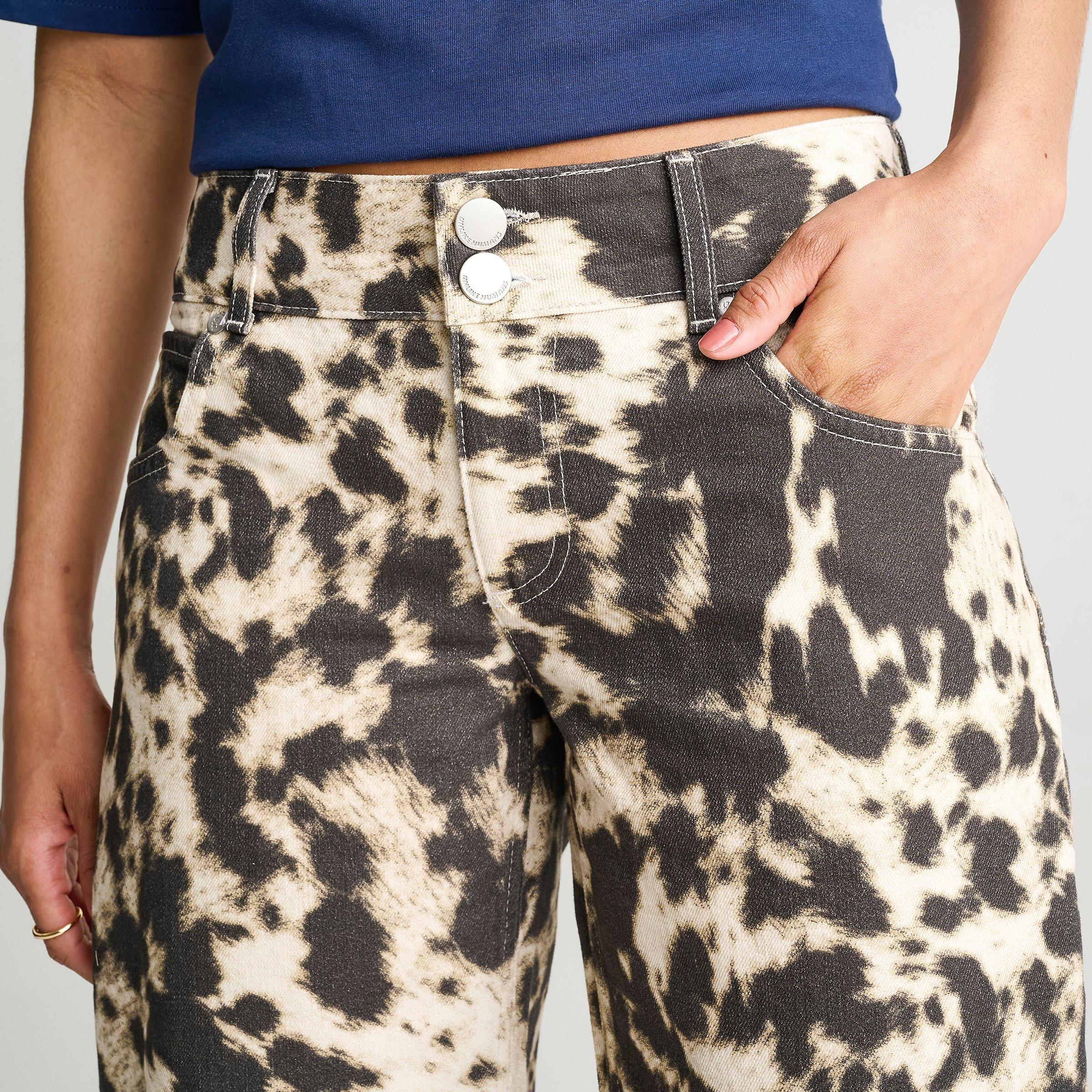 Women's Unlike Humans Low Rise Cow Print Denim Jeans