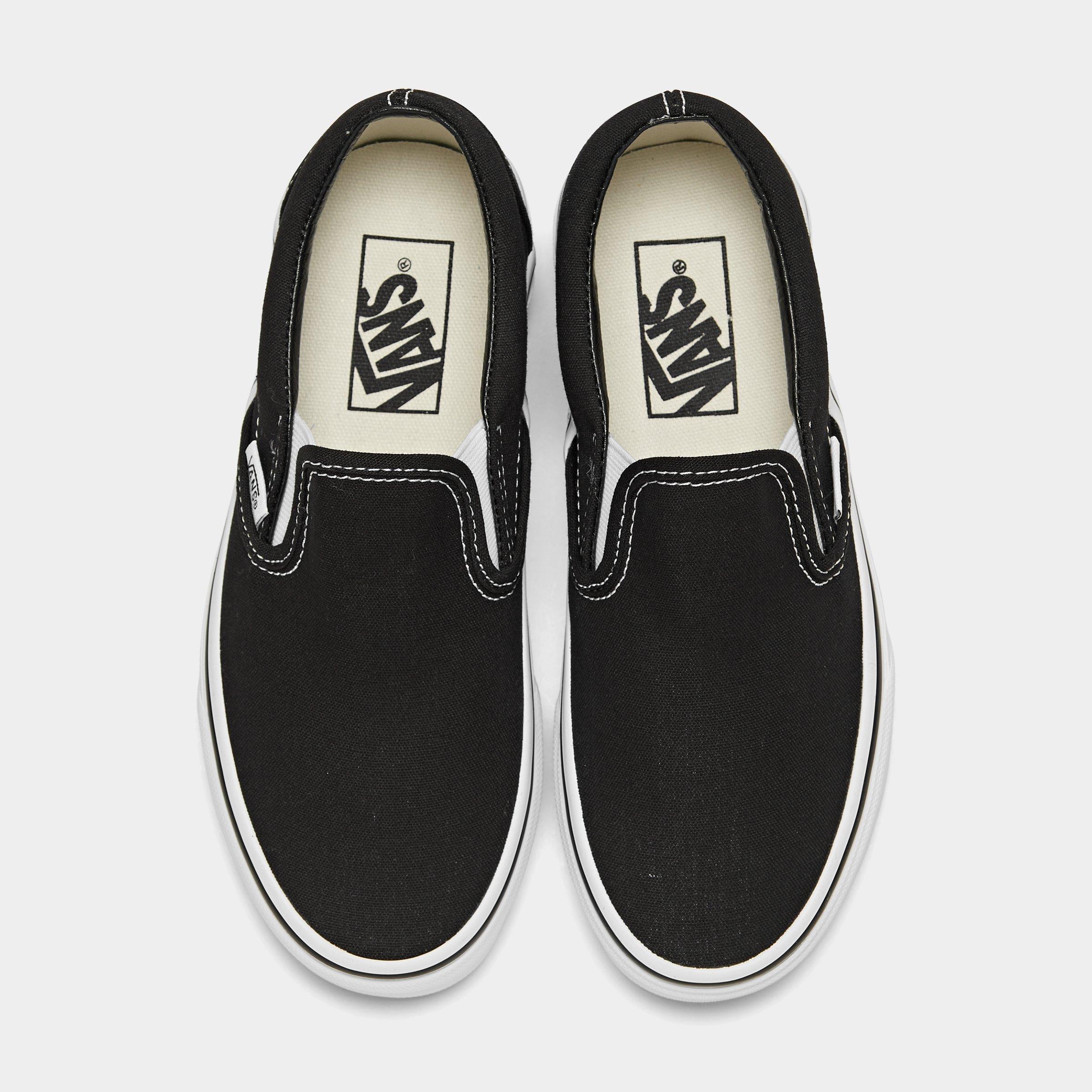 big kid slip on vans black