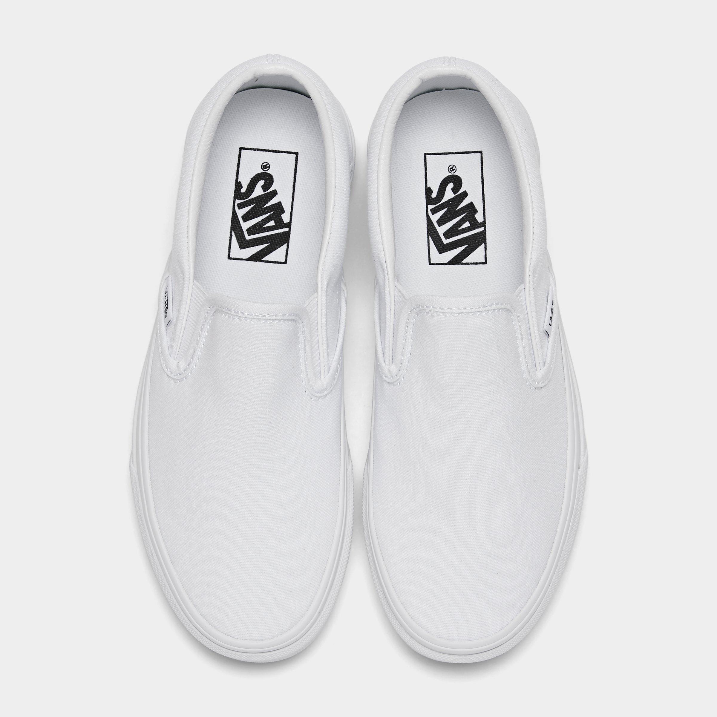 big kids white slip on vans