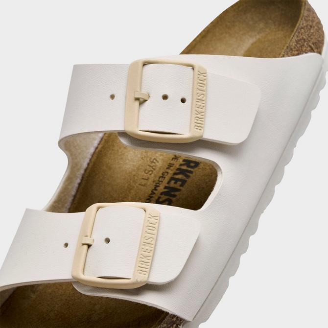 Front view of Women's Birkenstock Arizona Birkibuc Sandals (Big Kids Sizes Available) in Eggshell Click to zoom