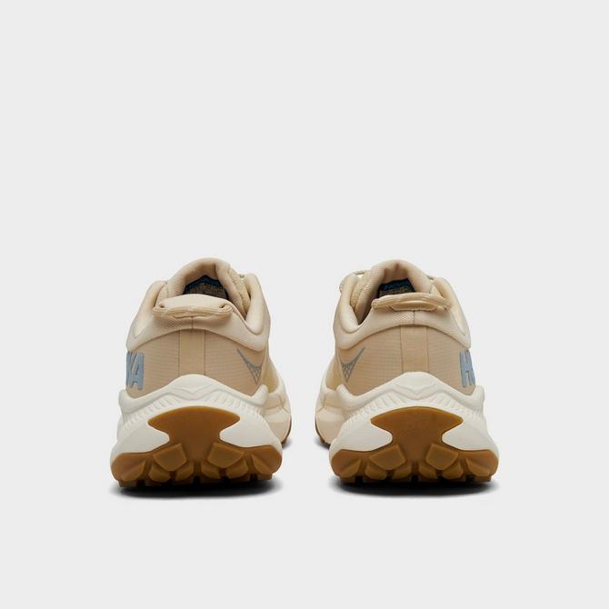 Left view of Women's HOKA Transport Athletic Lifestyle Shoes in Oak/Alabaster Click to zoom