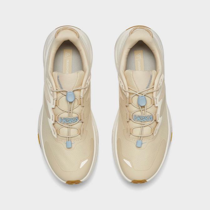 Back view of Women's HOKA Transport Athletic Lifestyle Shoes in Oak/Alabaster Click to zoom