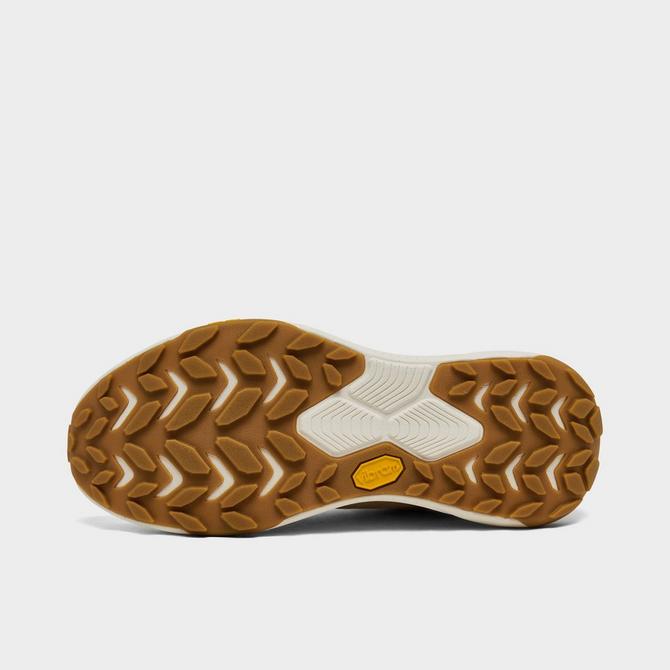 Bottom view of Women's HOKA Transport Athletic Lifestyle Shoes in Oak/Alabaster Click to zoom