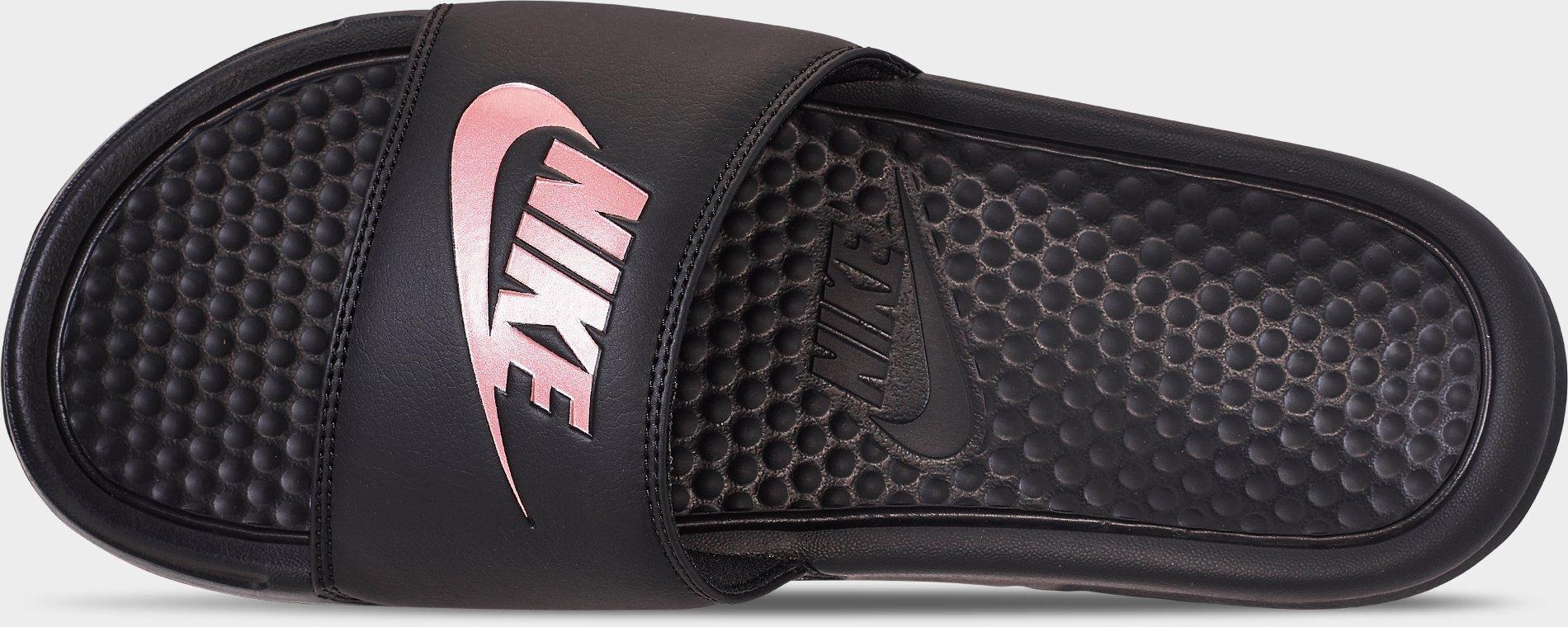 rose gold nike flip flops