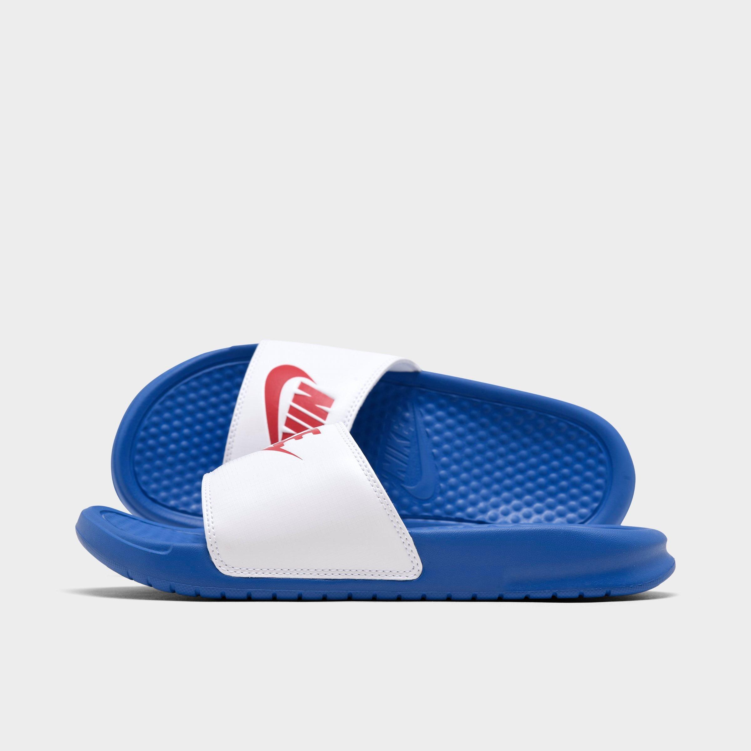 red and blue nike slides