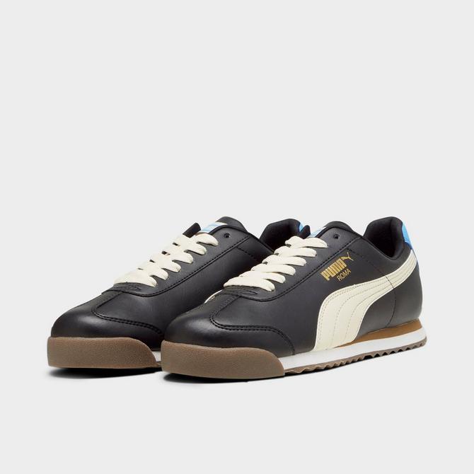 Black and outlet gold pumas quarters