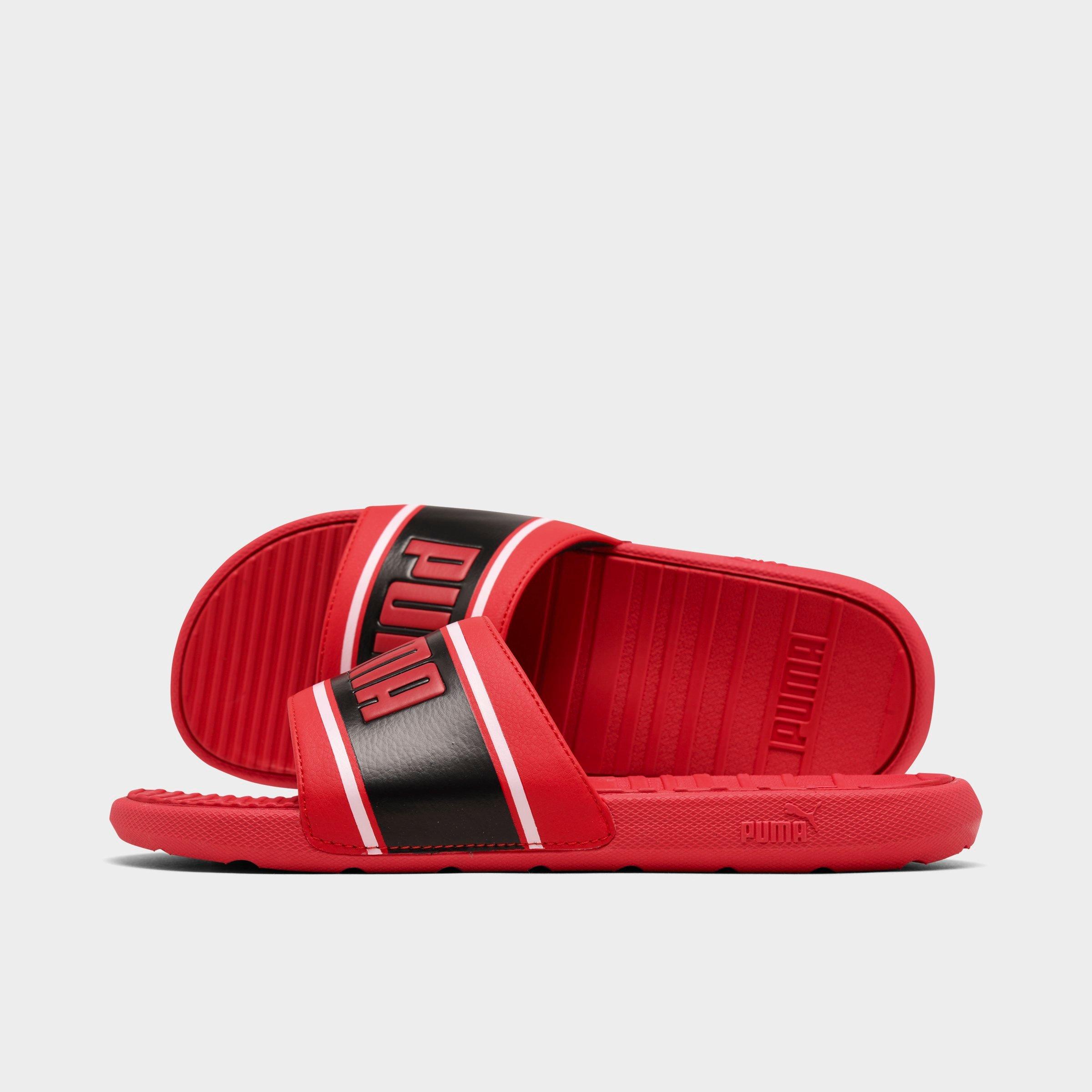 red and black puma slides