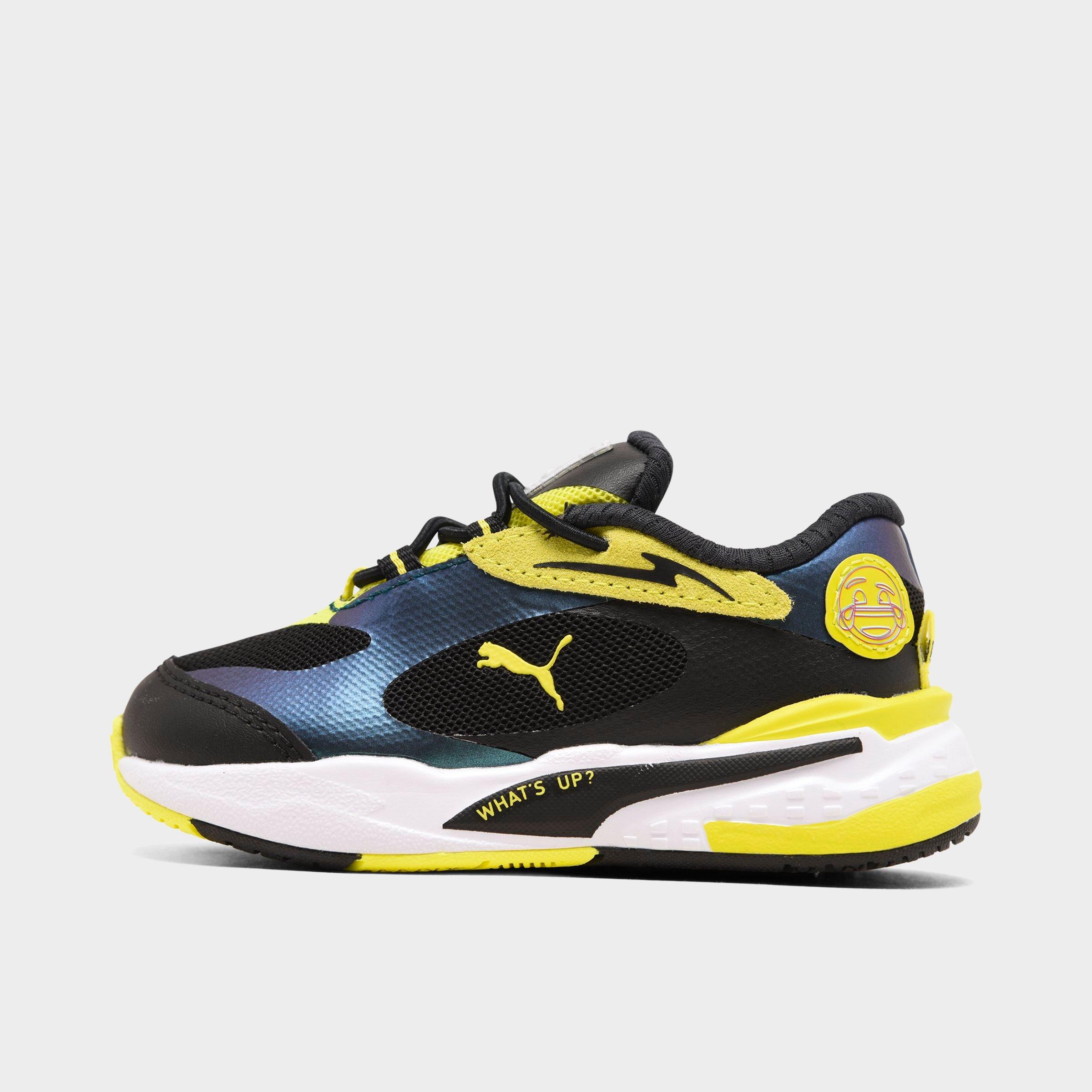 black and yellow puma shoes