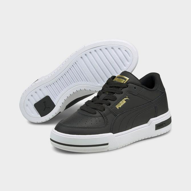 Black and shop gold pumas quarters