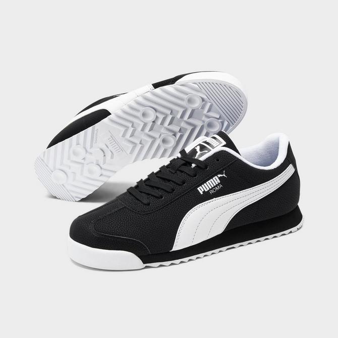 Black puma shop roma trainers