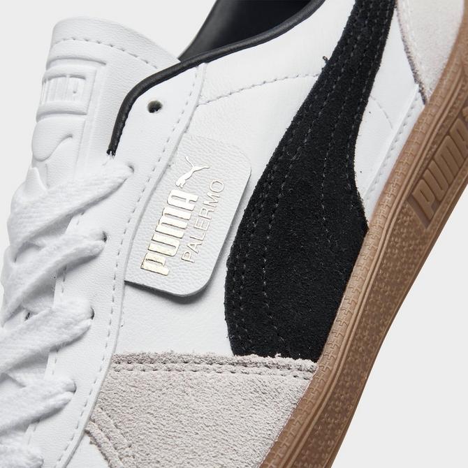 PUMA Palermo Leather sneakers in black and white