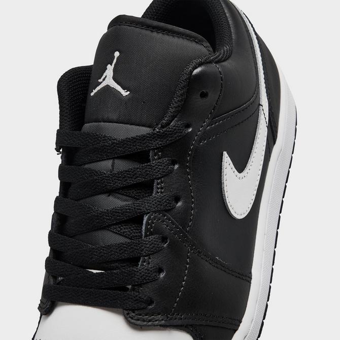 Front view of Men's Air Jordan Retro 1 Low Casual Shoes in Black/Summit White Click to zoom
