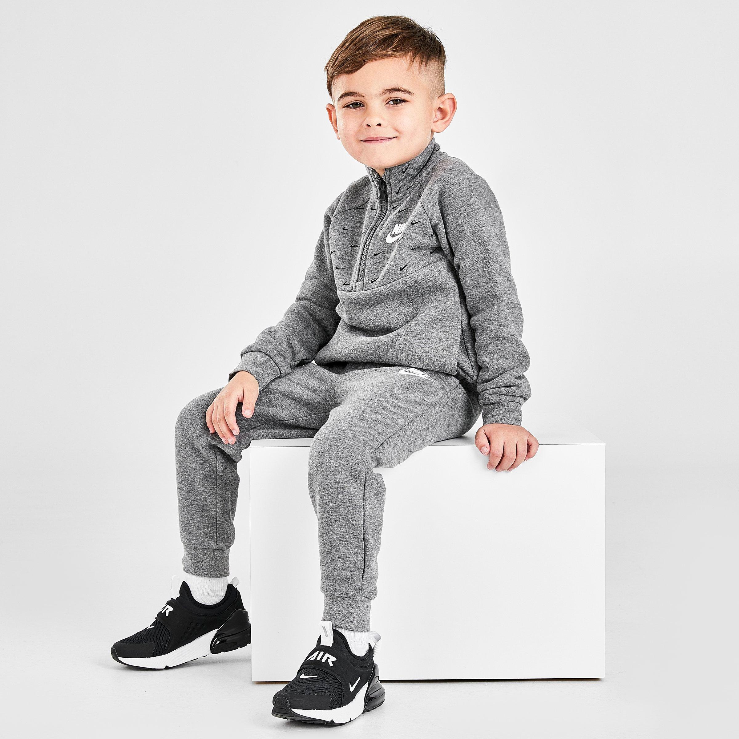 nike swoosh all over joggers