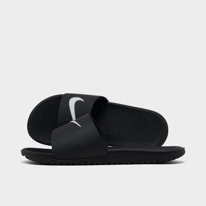 Nike slide sandals store youth