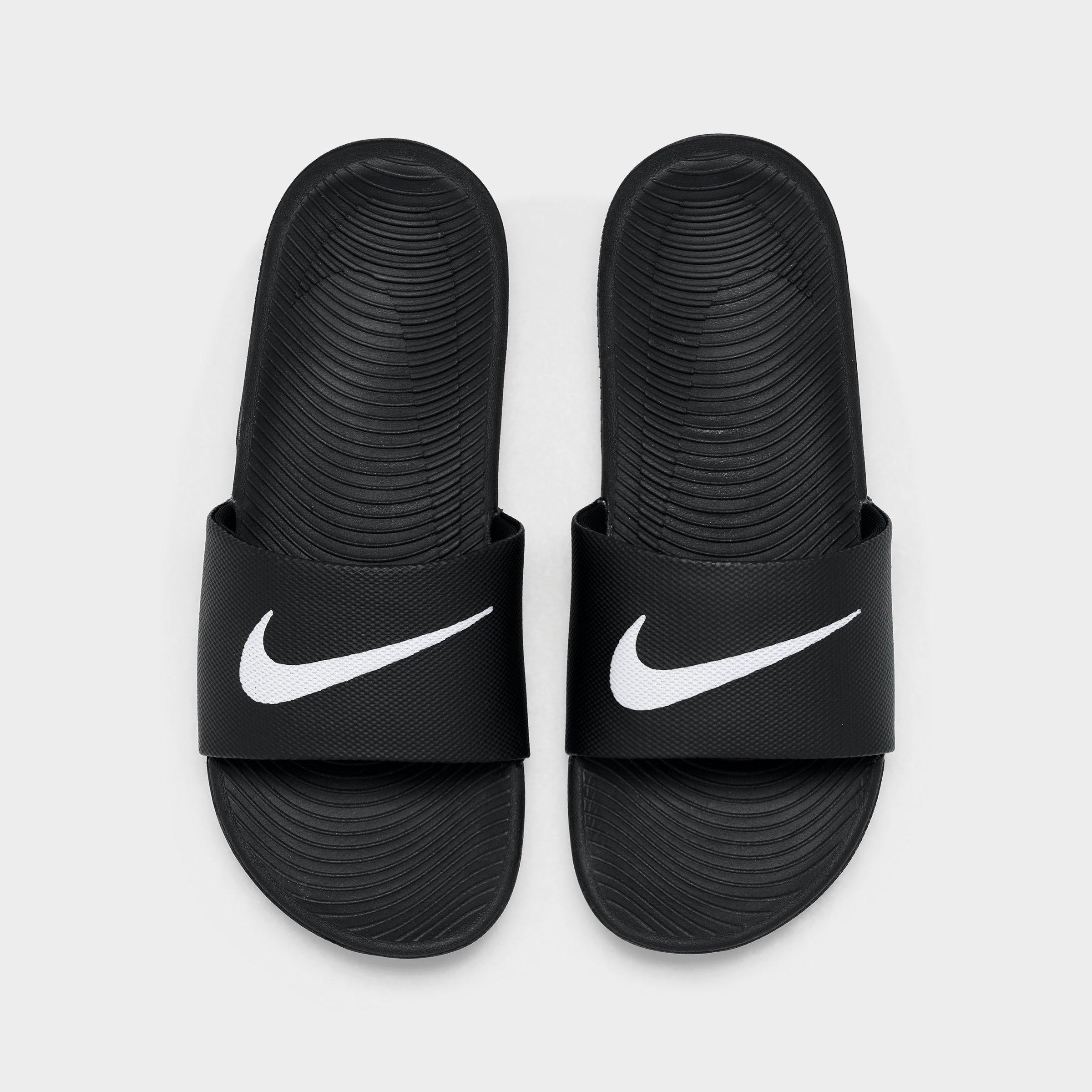 nike black and white kawa slides