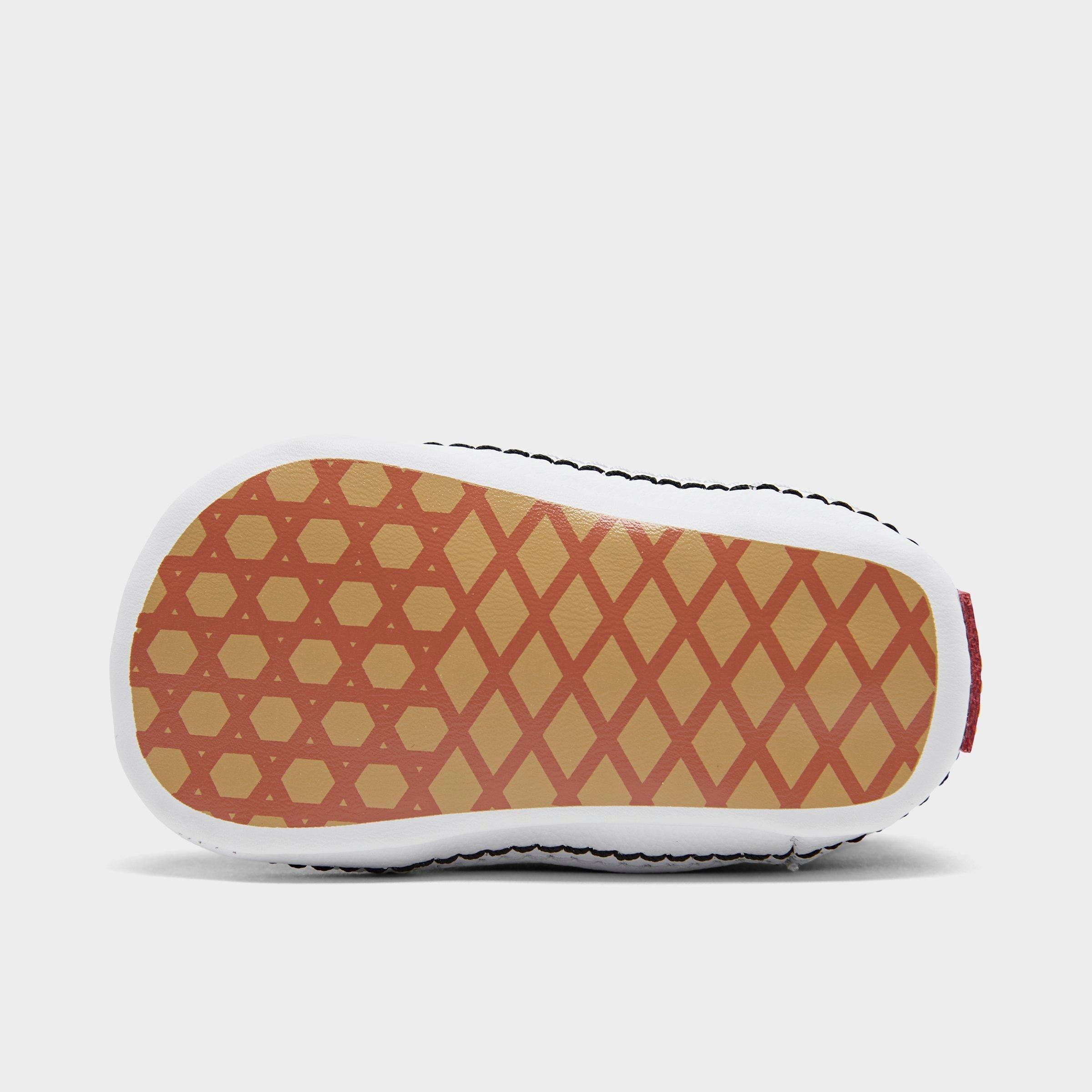 white vans with orange bottom