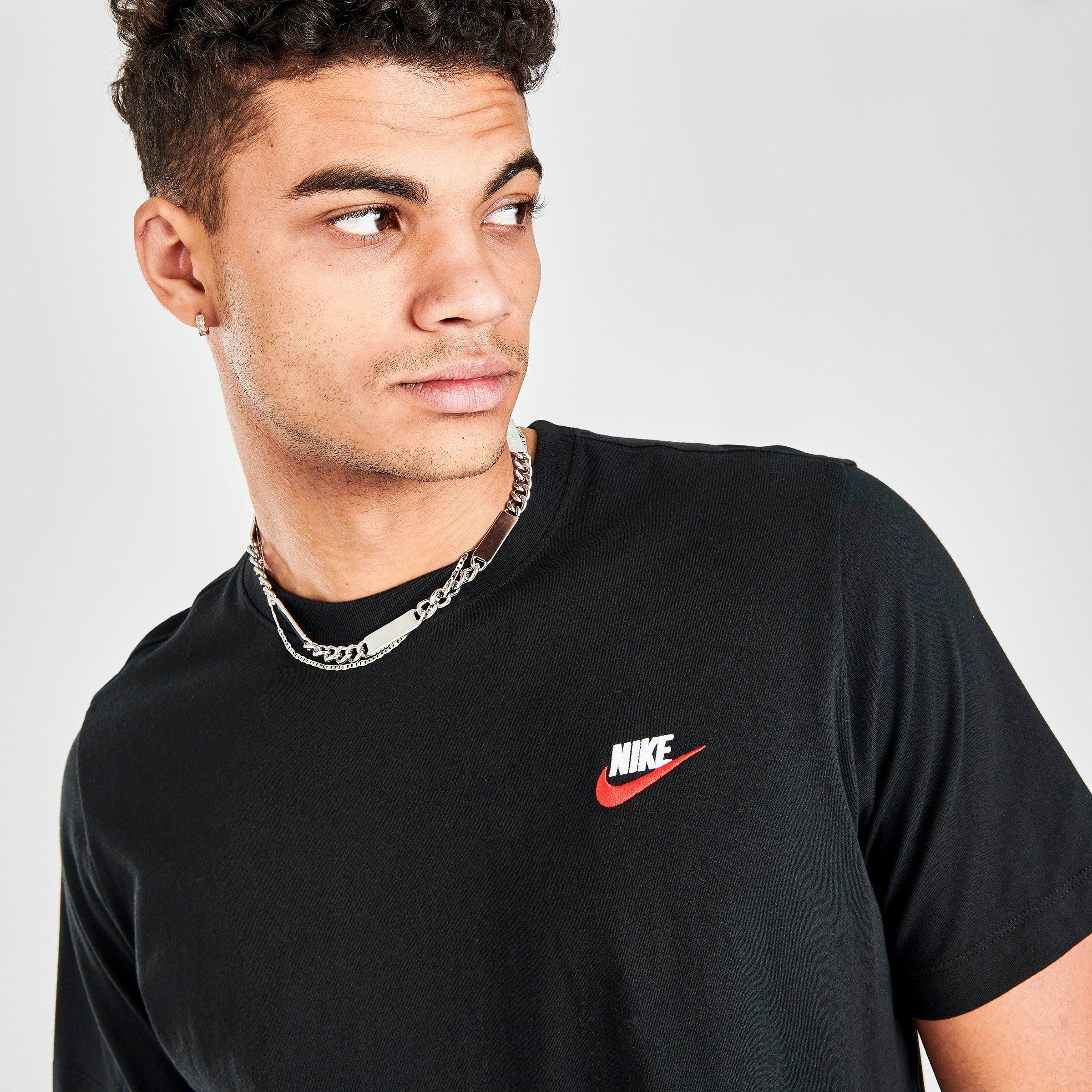 white red and black nike shirt