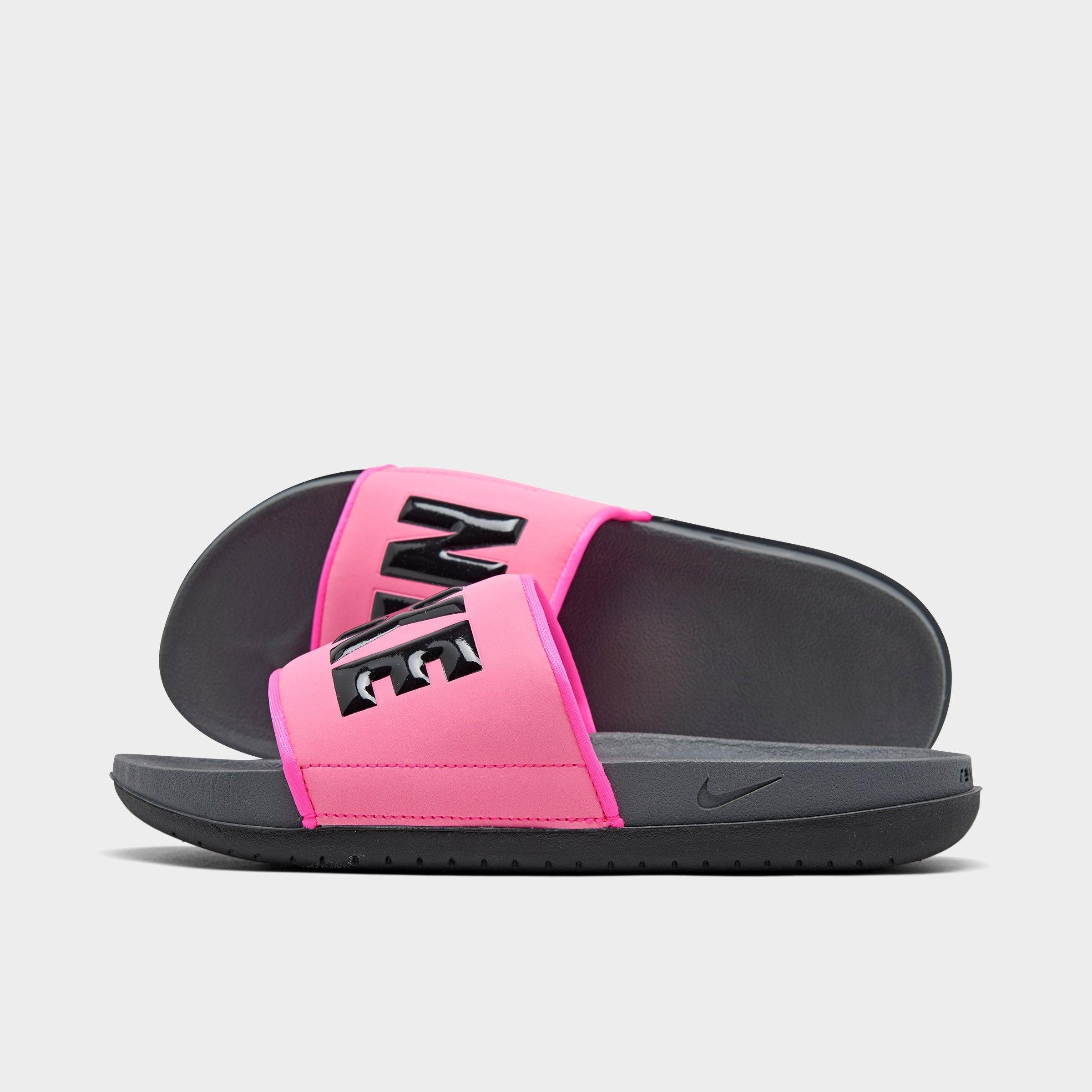 black and pink nike sliders