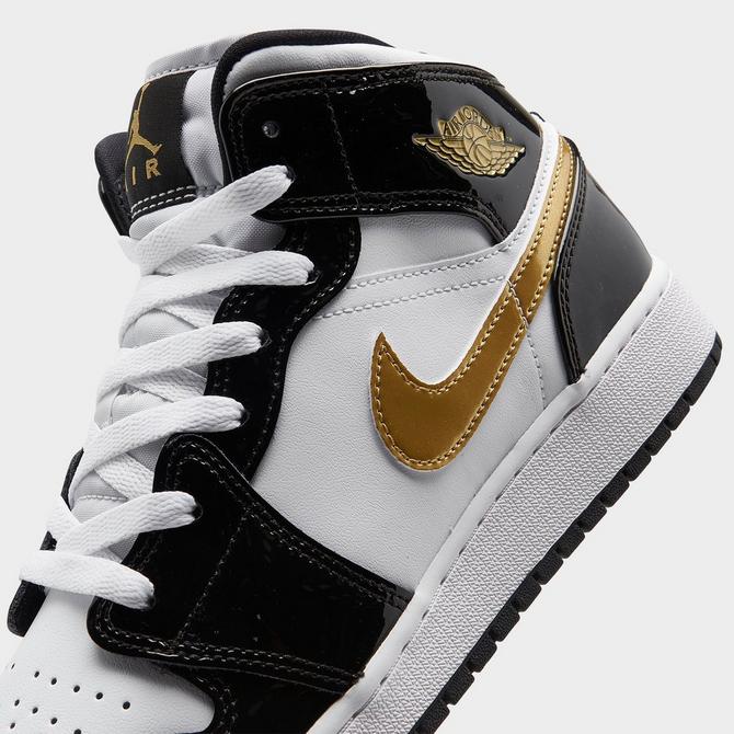 Black and gold outlet jordans kids