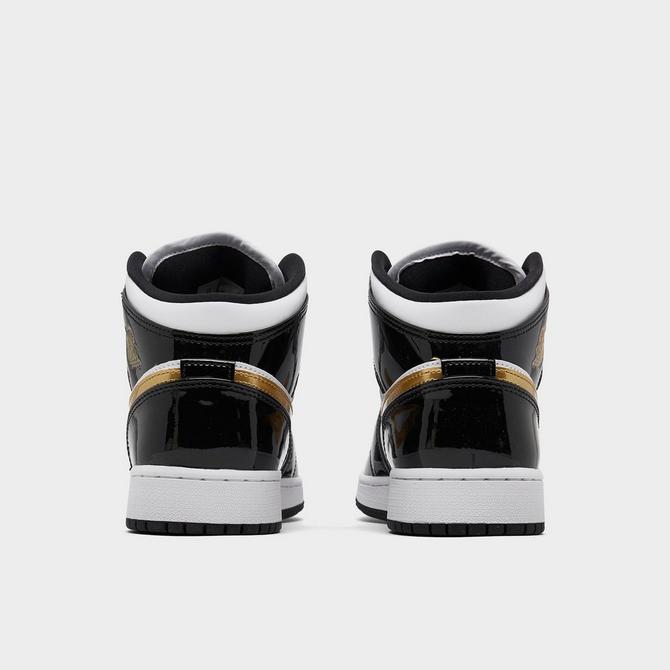 Black and 2025 gold kids jordans