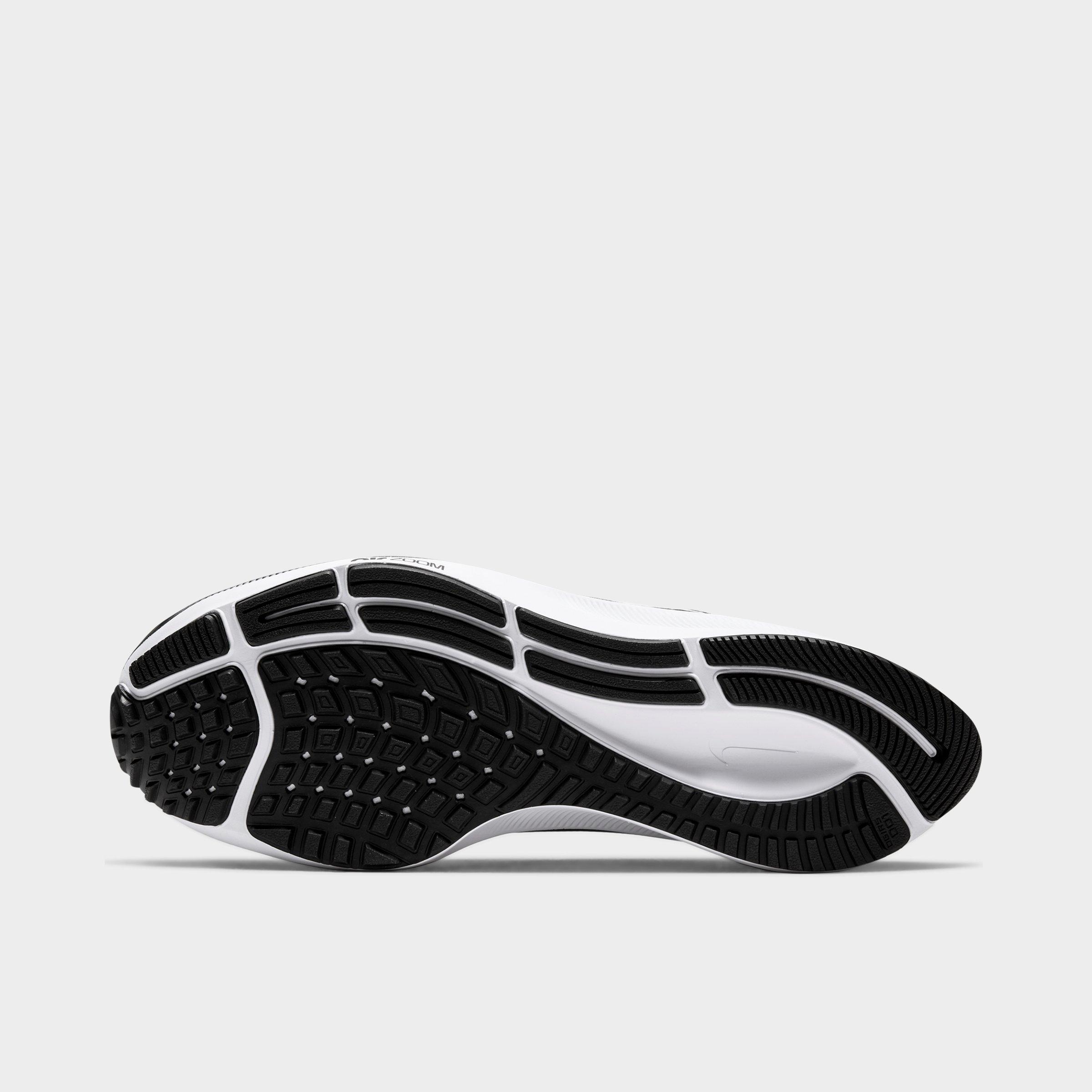 black white nike running shoes