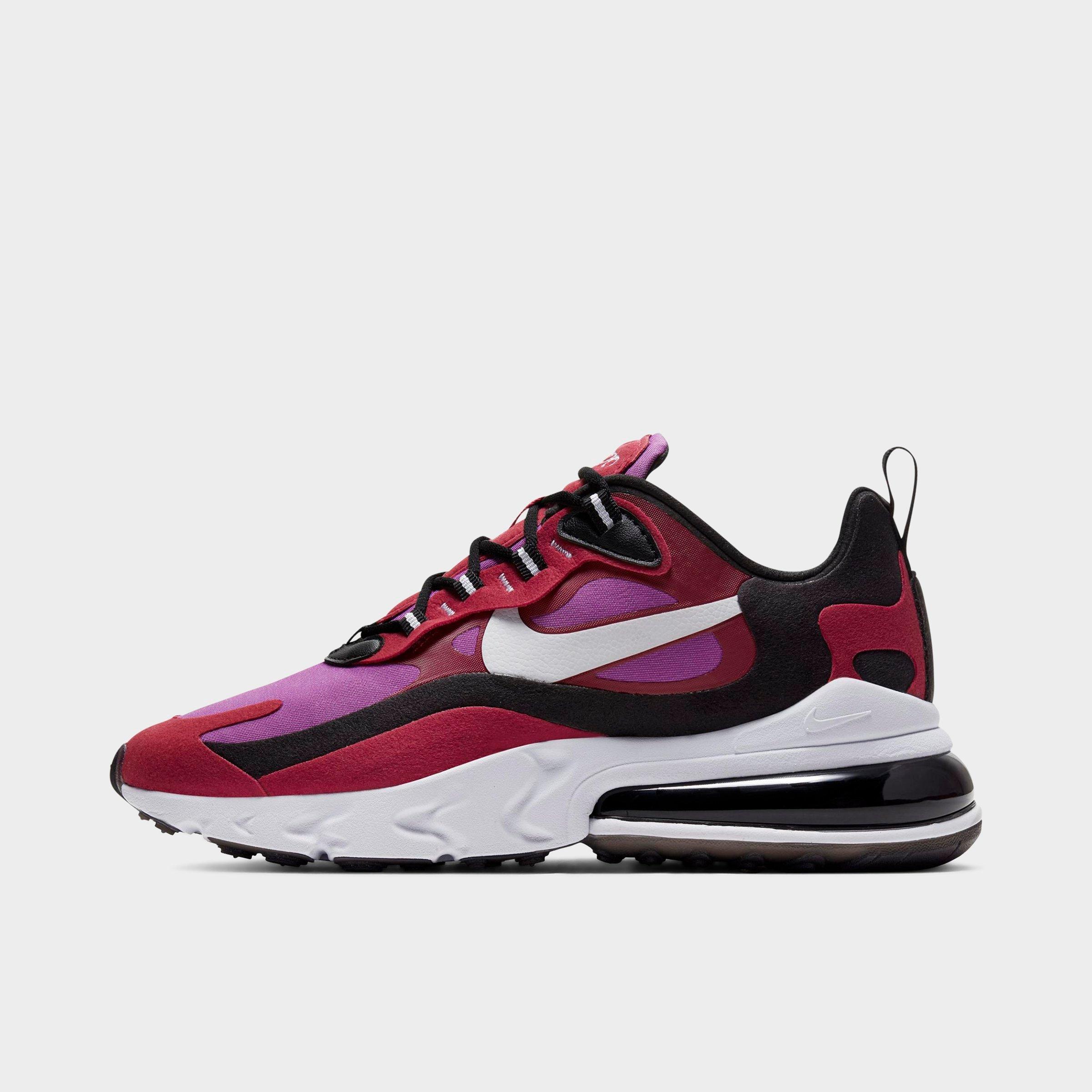 red and purple nike shoes