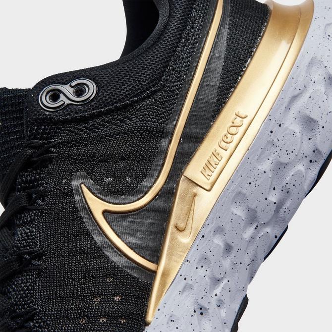 Women's nike black clearance and gold running shoes