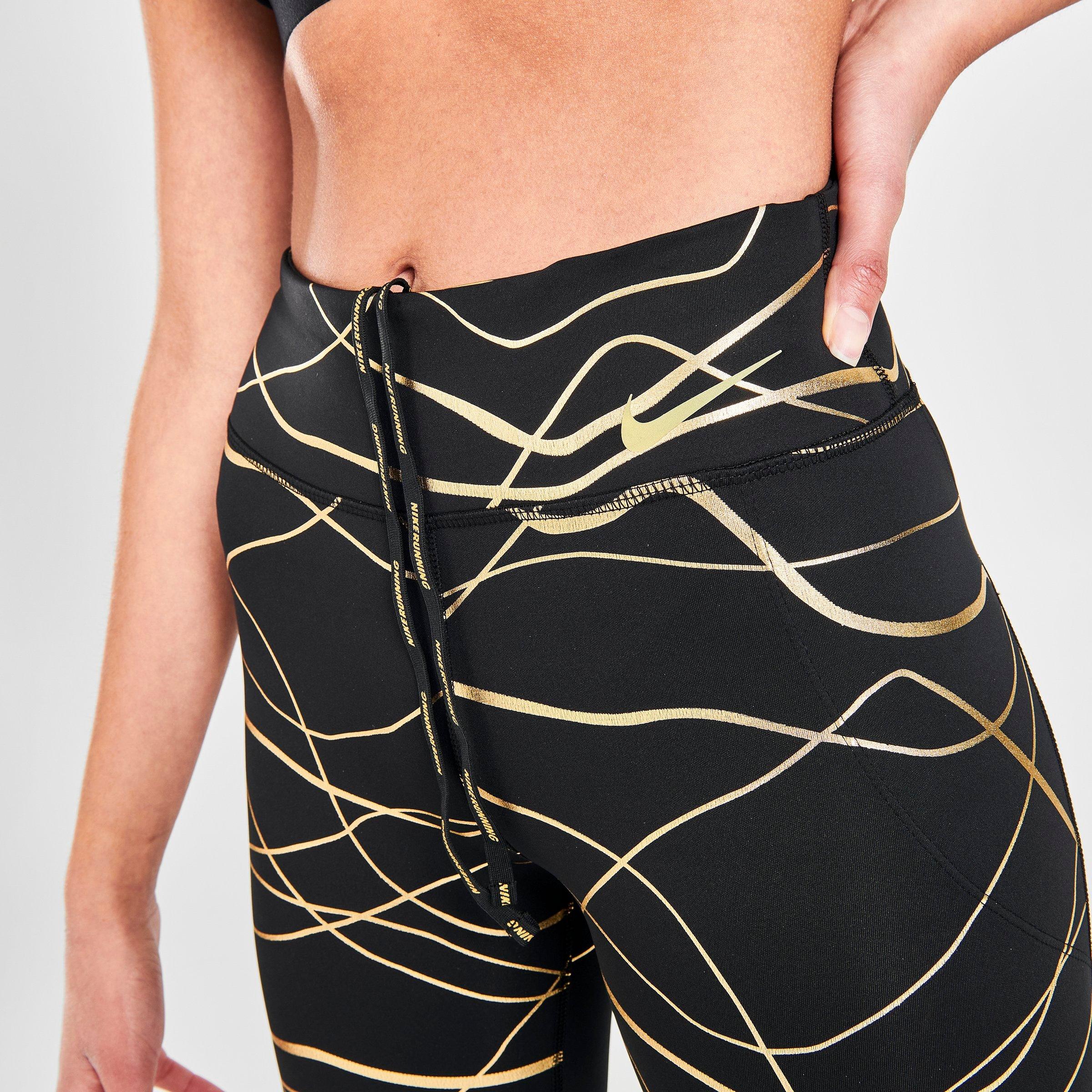black and gold nike tights