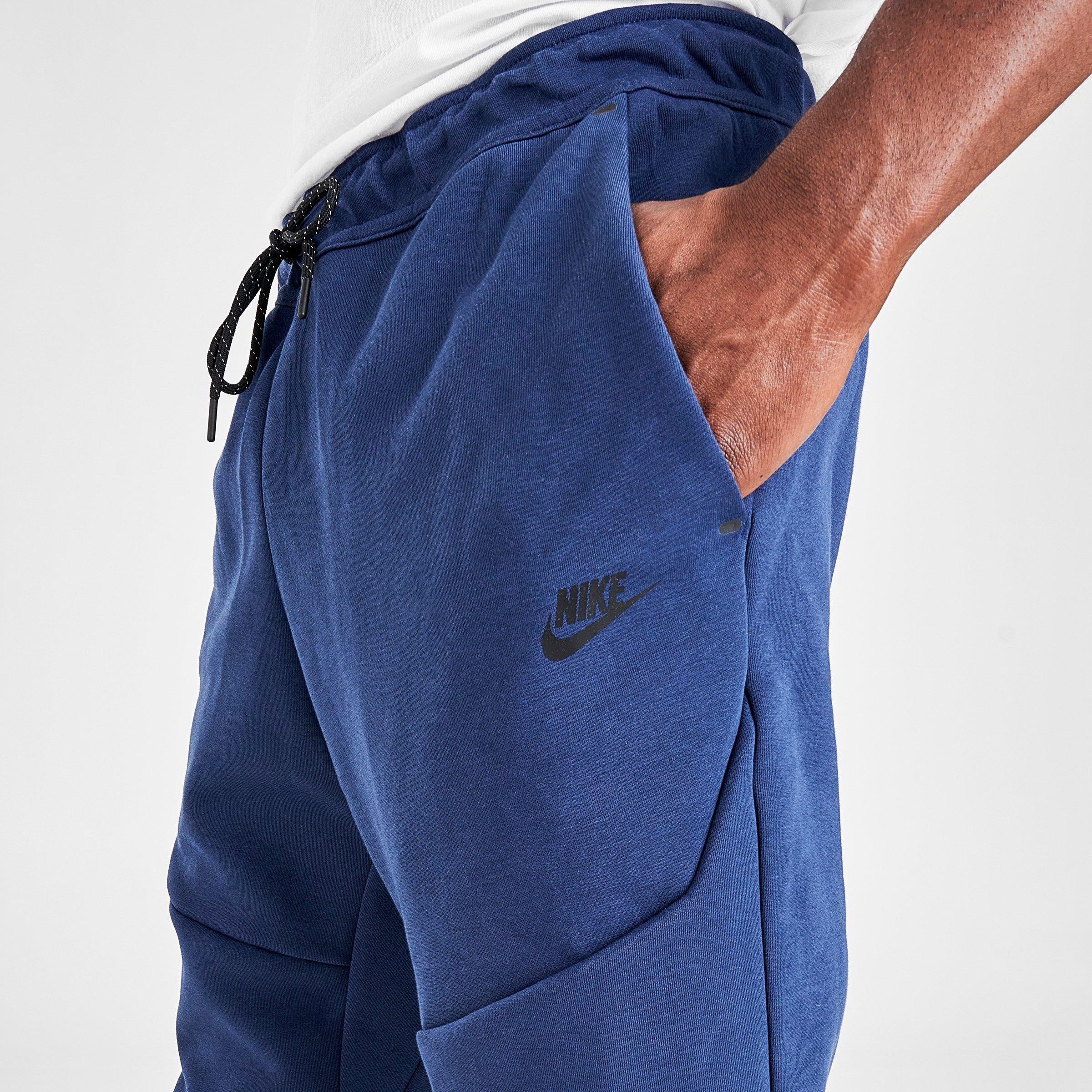 nike tech pants navy blue