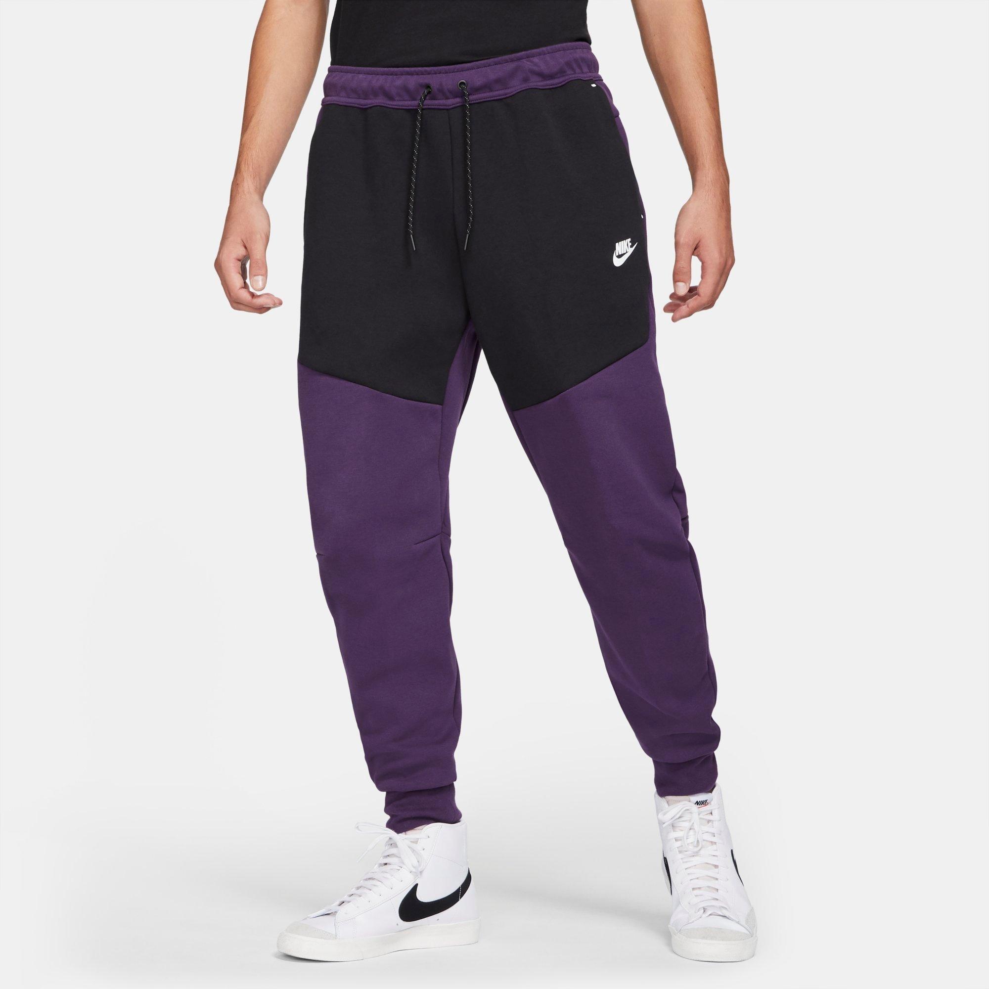 purple nike tech pants