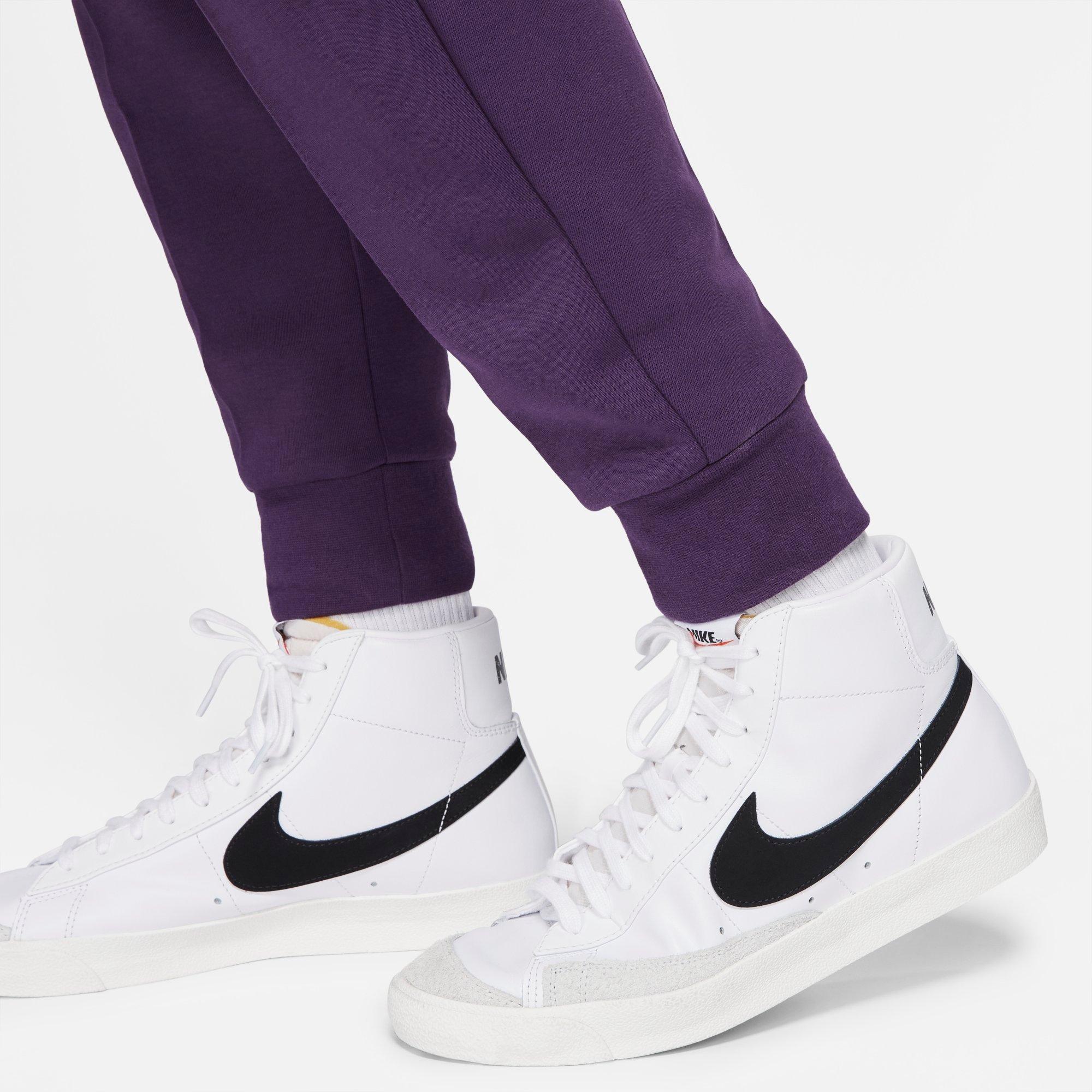 purple nike tech pants