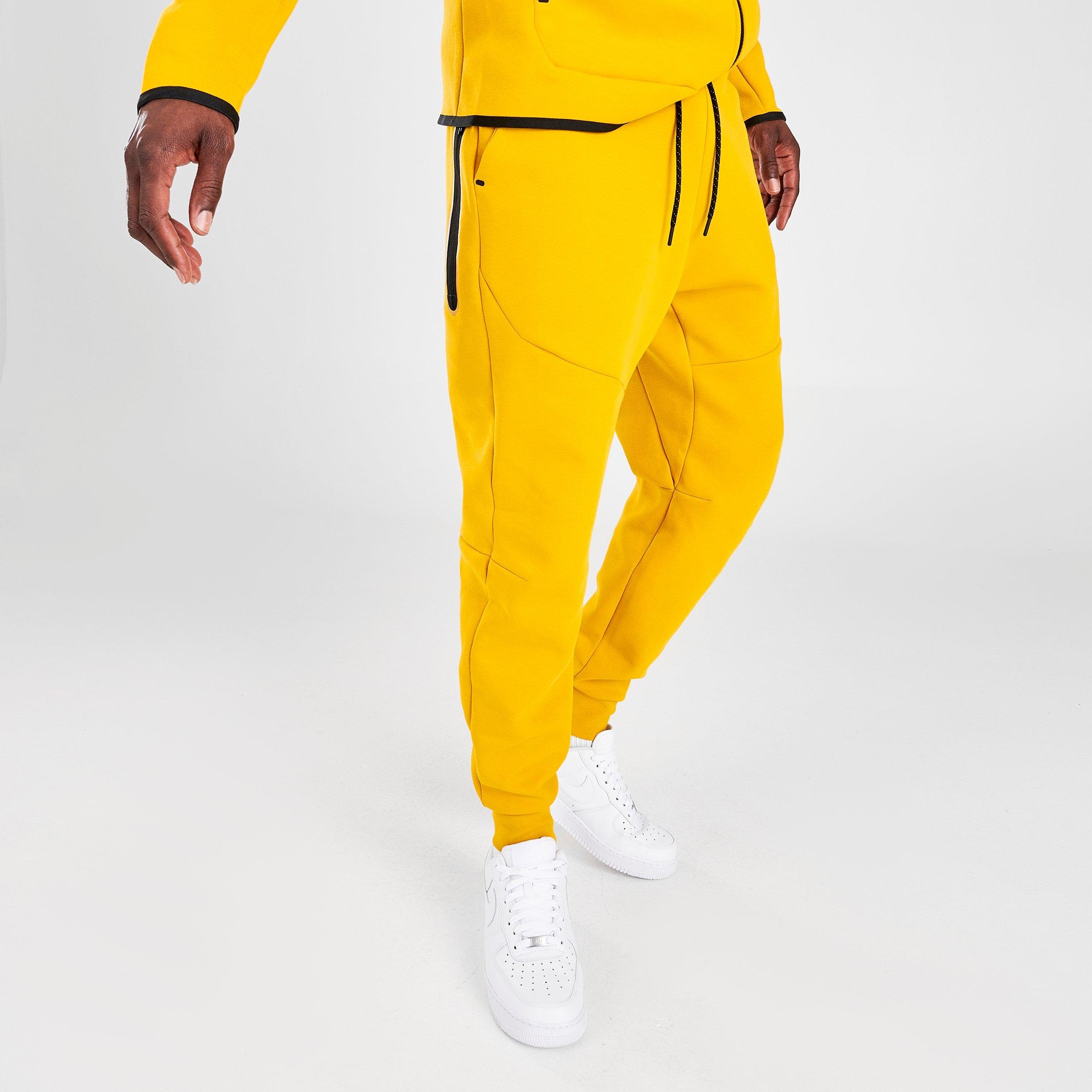 yellow nike tech fleece pants