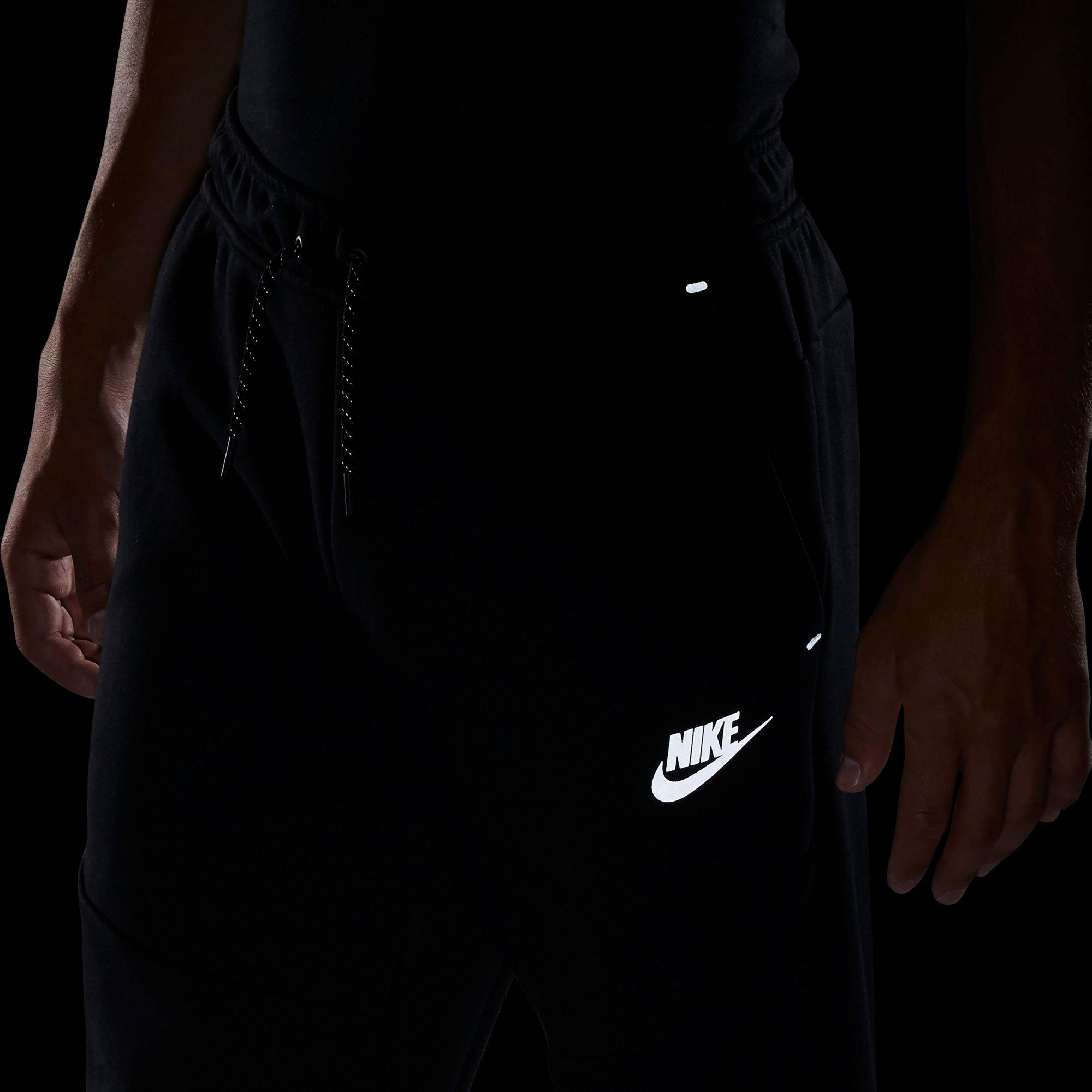 nike tech pants reflective
