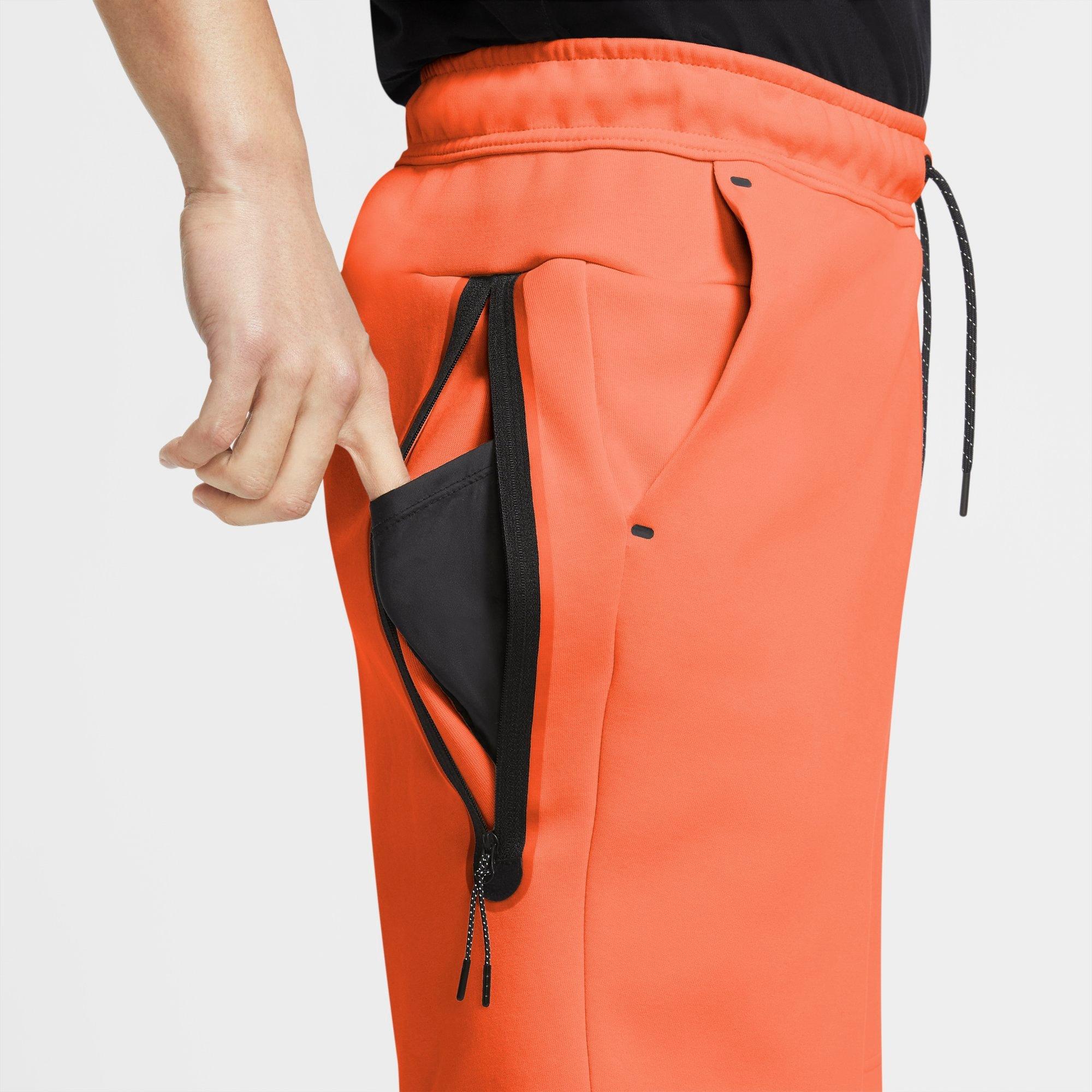 orange nike fleece shorts