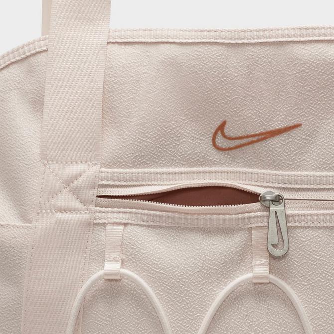 nike women sportswear futura 365 faux fur mini backpack 6l guava ice guava  ice black