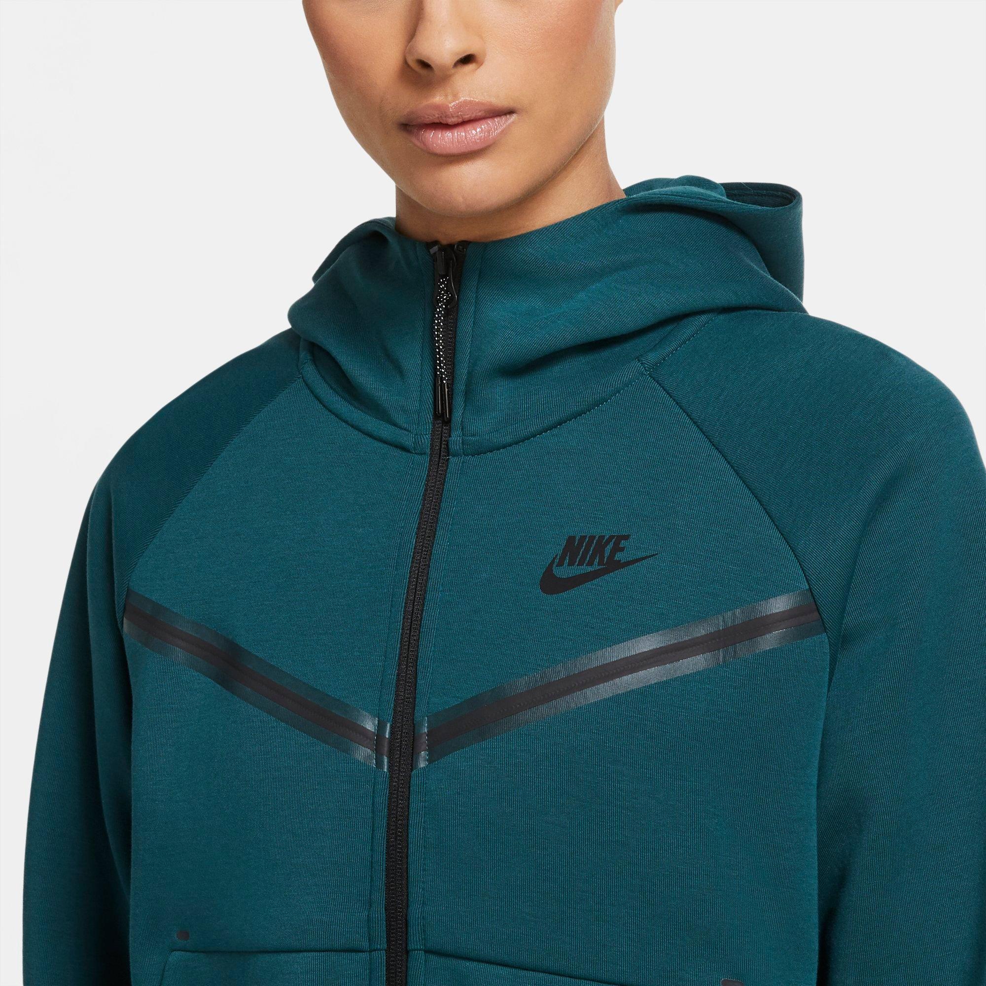 teal nike tech