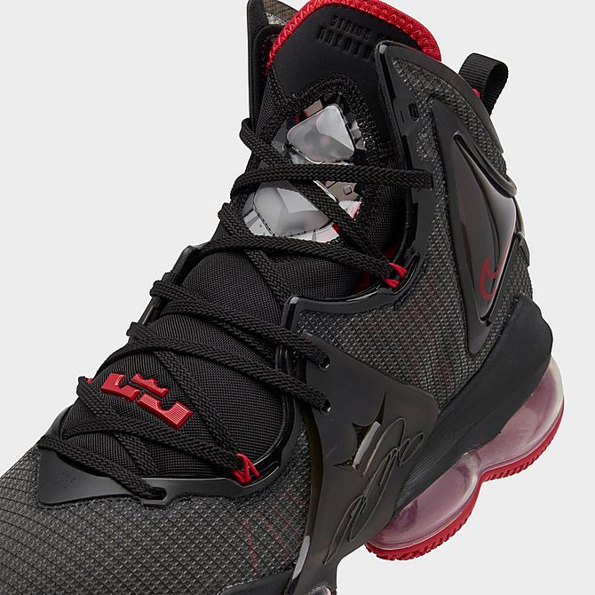 Front view of Nike LeBron 19 Basketball Shoes in Black/Black/University Red Click to zoom