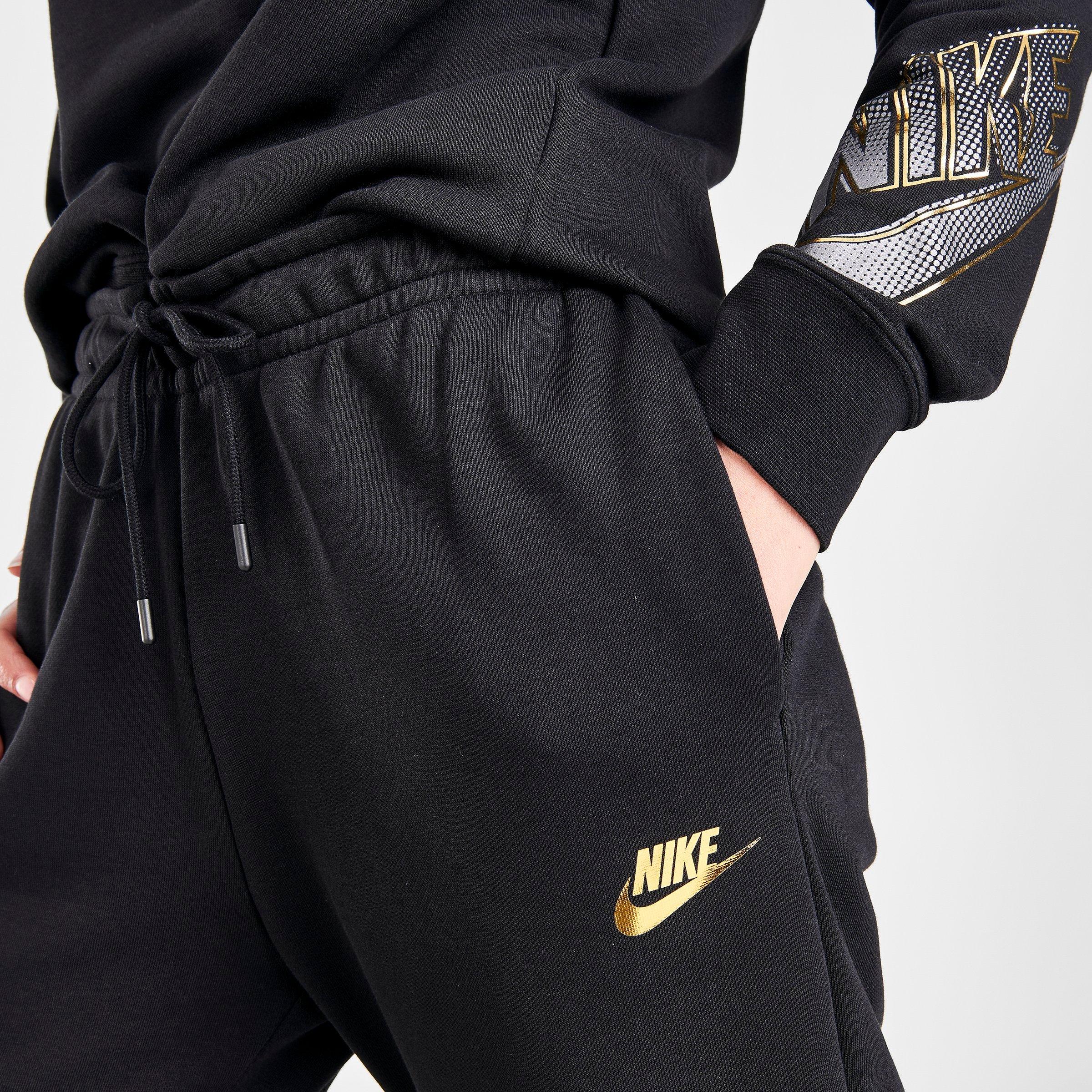 gold nike pants