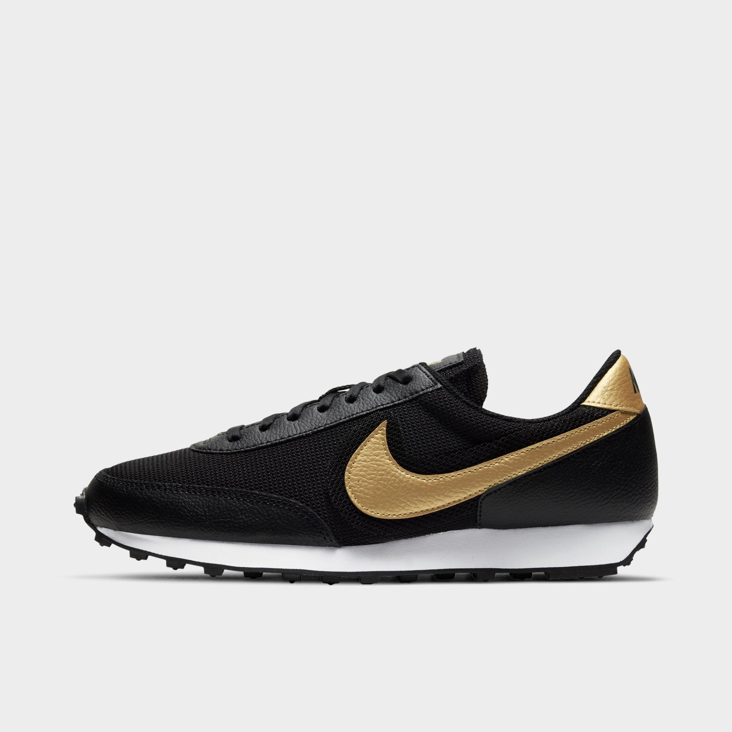 womens nike black and gold shoes
