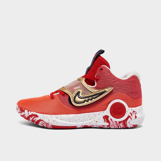 white and gold nike basketball shoes