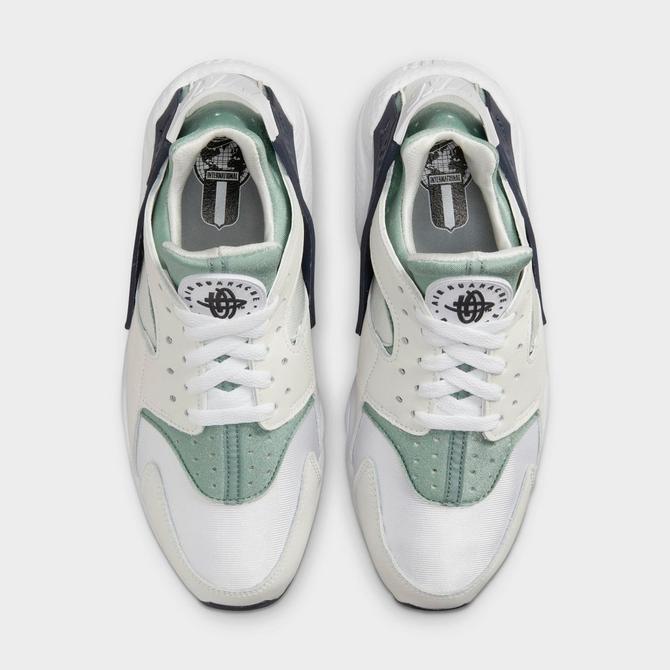 Women's nike air huarache shop city low premium casual shoes