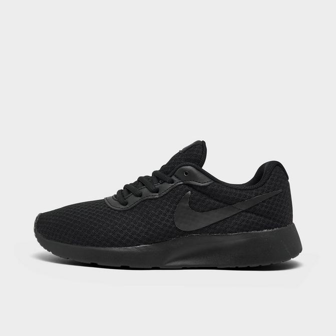 Nike tanjun womens casual shop shoes black / white