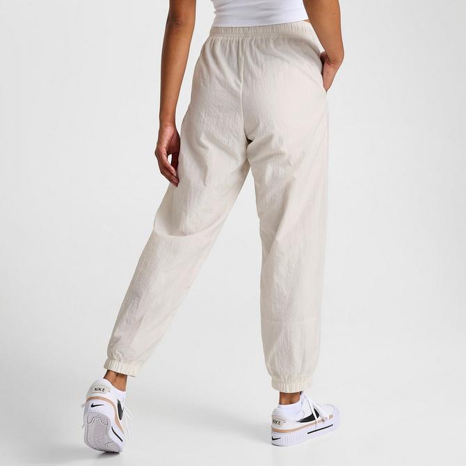 Nike nylon pants womens on sale