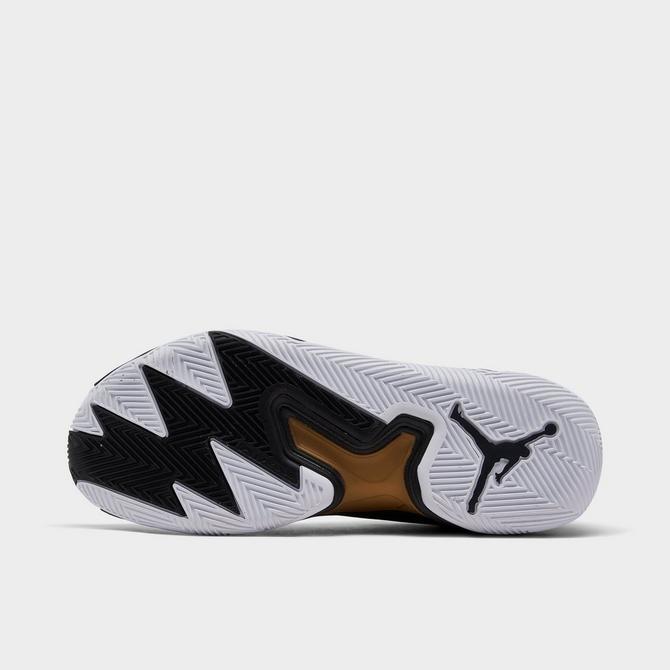 Black white and hotsell gold nike basketball shoes