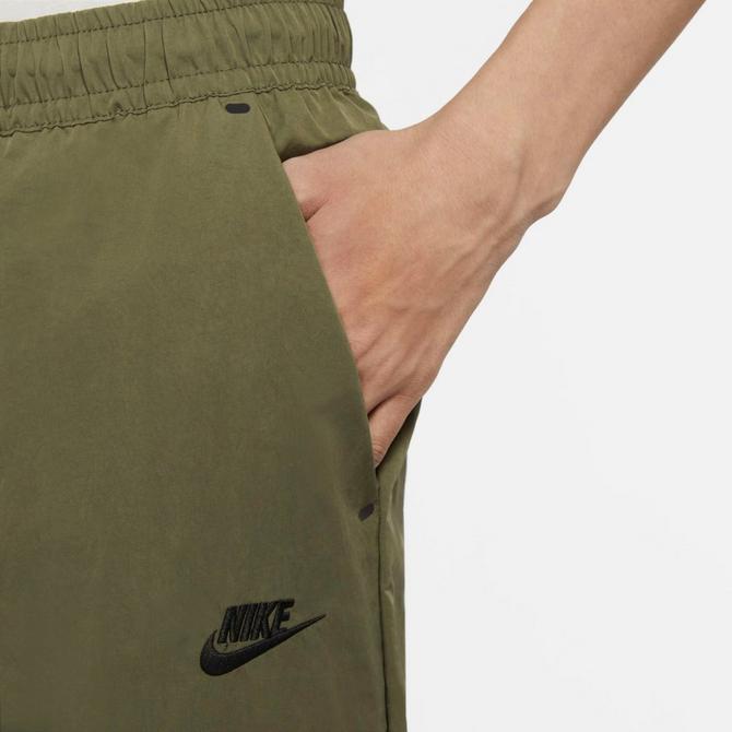 Nike Sportswear TECH PANT - Tracksuit bottoms - medium olive/black