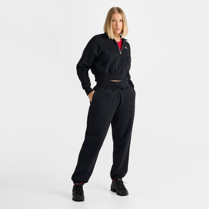 Nike Plus mini swoosh oversized high rise joggers in black and sail